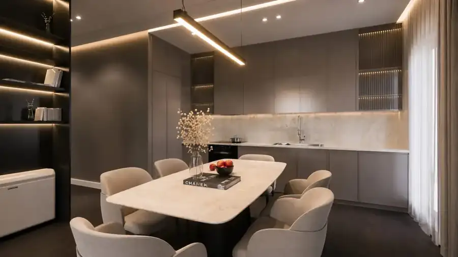Cucina e zona pranzo con illuminazione lineare